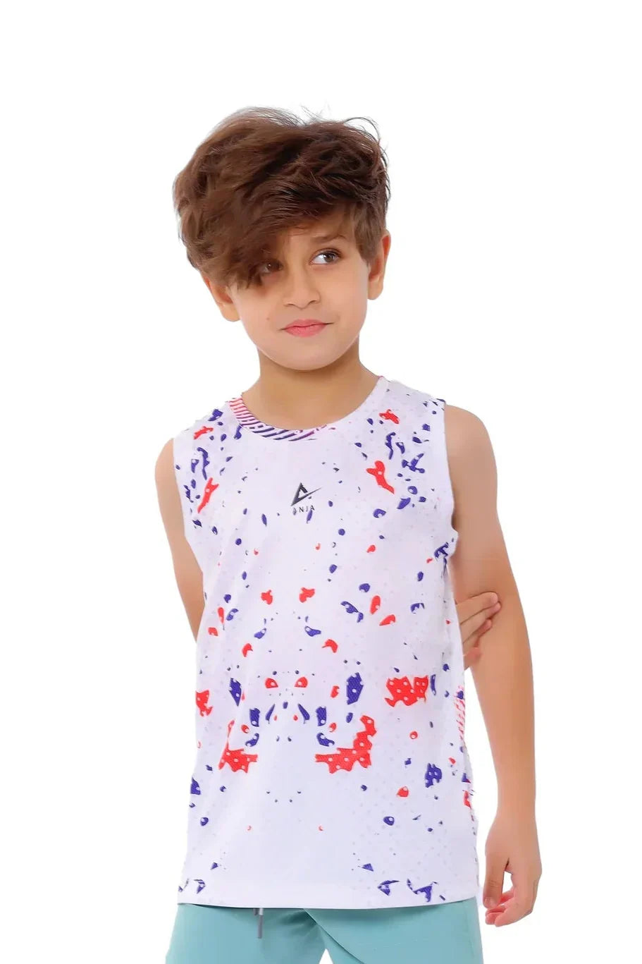 Child wearing a sleeveless shirt with colorful abstract pattern on a white background