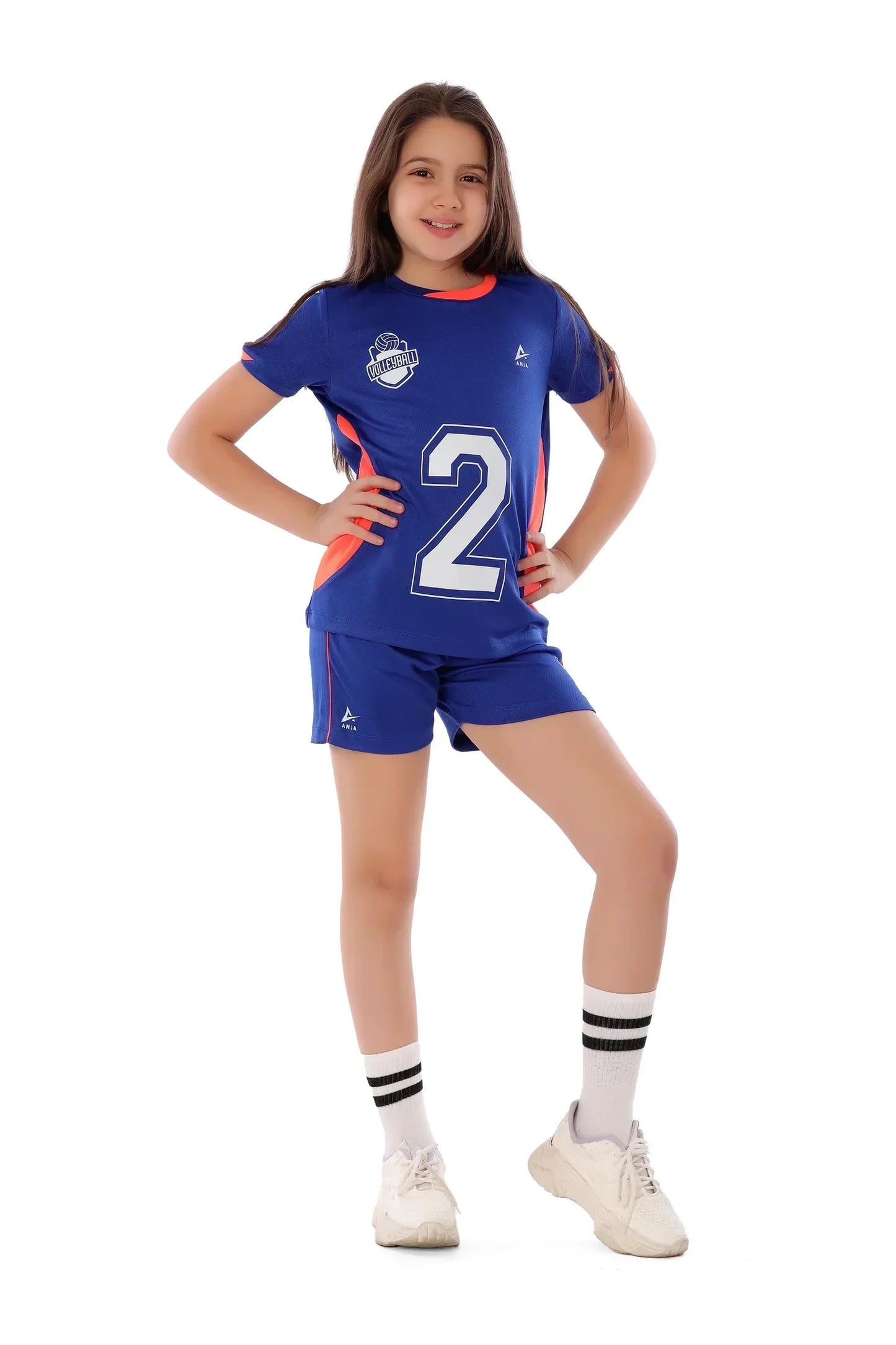 Child wearing a blue sports outfit with number 2 on a white background