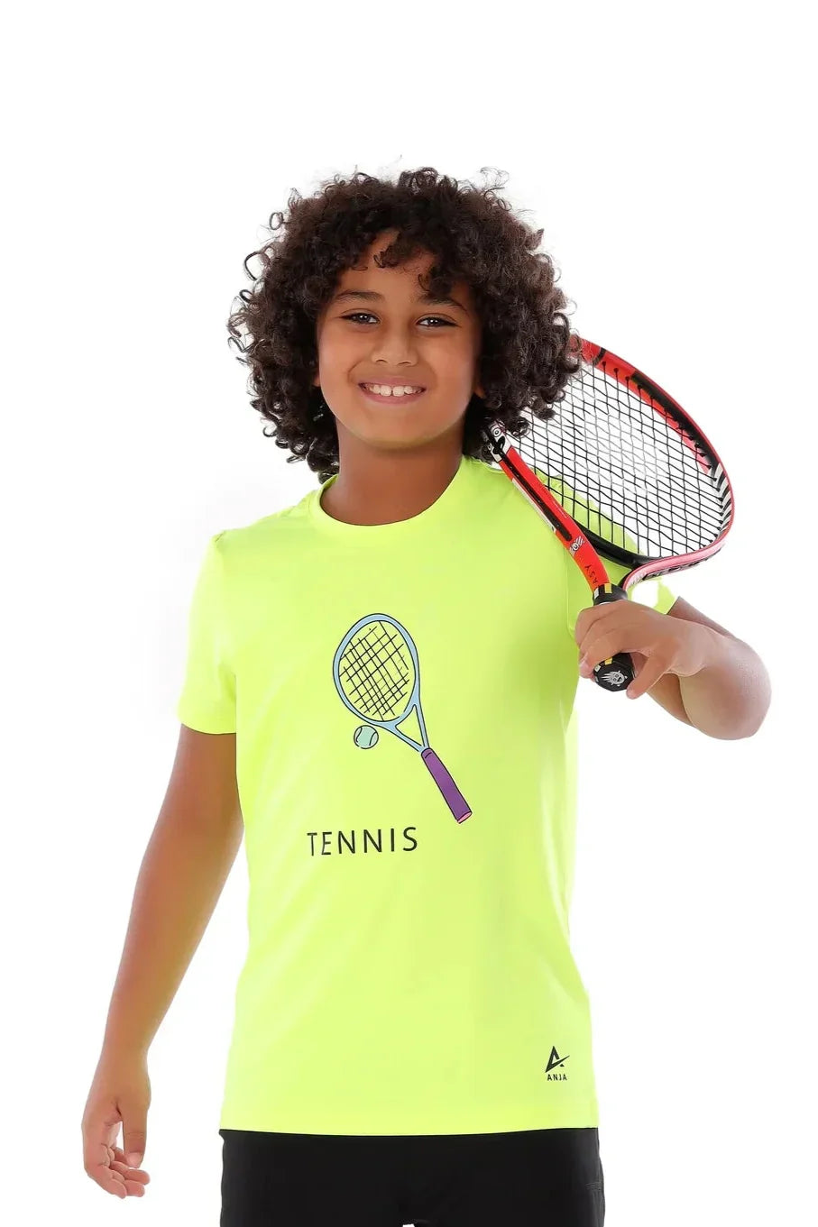 Child wearing a bright yellow tennis shirt with a racket graphic and the word 'Tennis'.