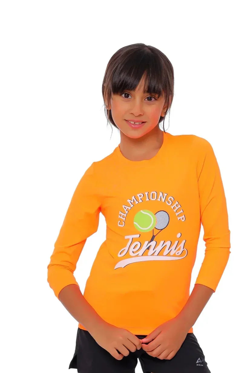 Child wearing an orange 'Championship Tennis' shirt on a white background