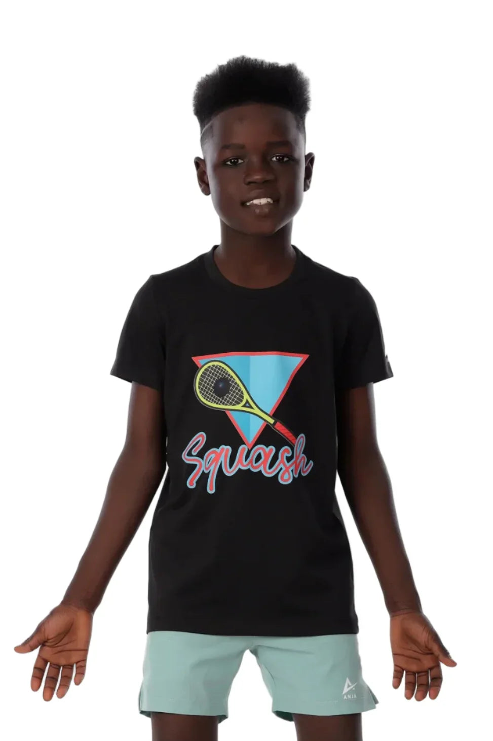 Child wearing a black t-shirt with a colorful graphic and 'Squash' text on a white background