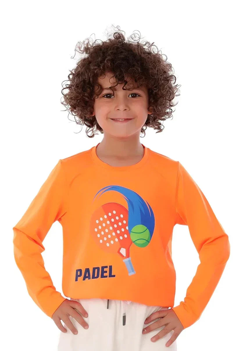Child wearing an orange long-sleeve shirt with a paddle and ball design, labeled 'PADEL'.