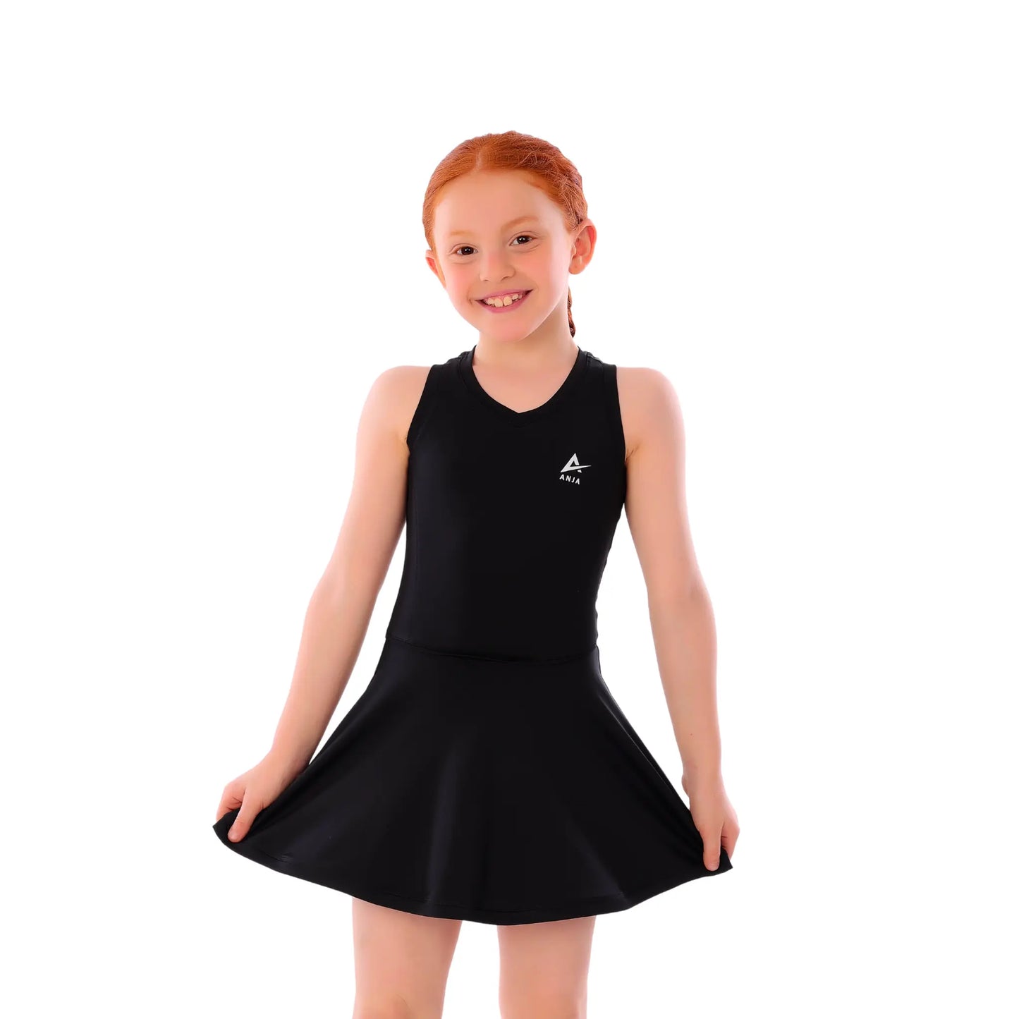 Young girl wearing a black dress with a logo on a white background