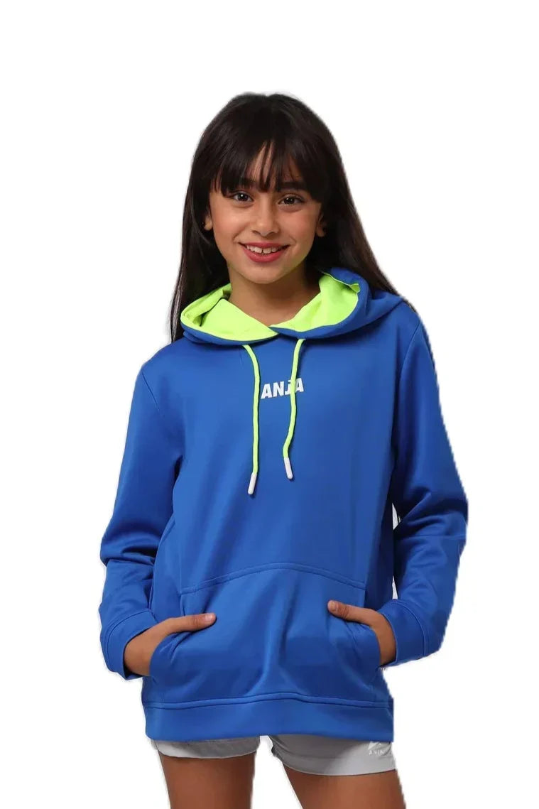 Woman wearing a blue hoodie with a green hood on a white background