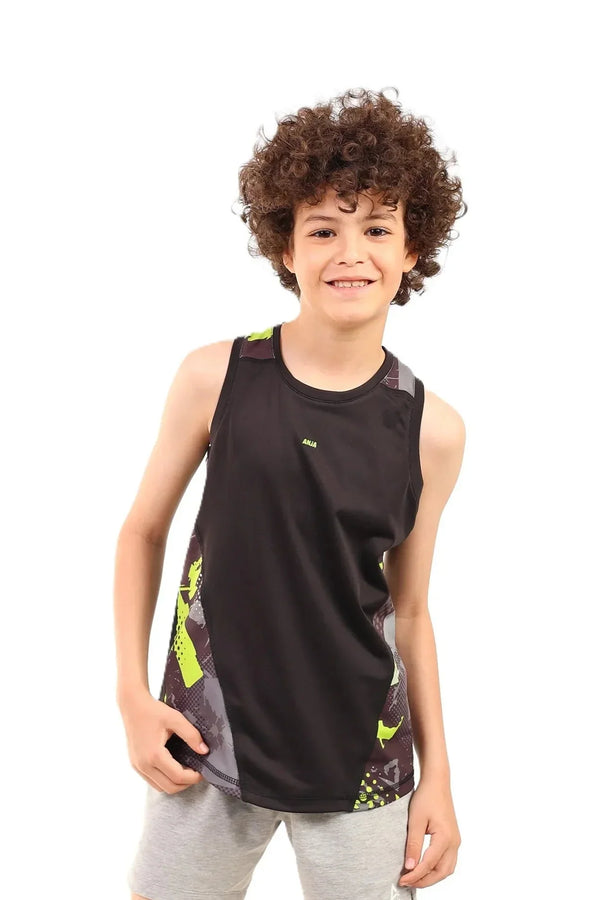 Child wearing a black sleeveless shirt with colorful designs on a white background