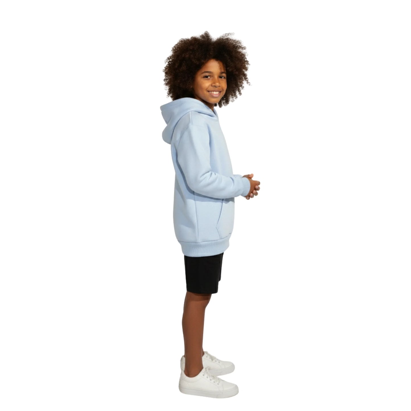Child wearing a light blue hoodie on a white background
