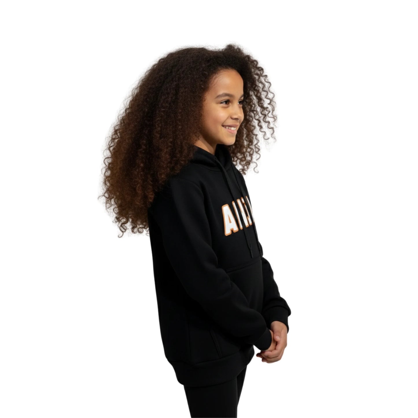 Child wearing a black hoodie with 'AIR' printed on it against a white background