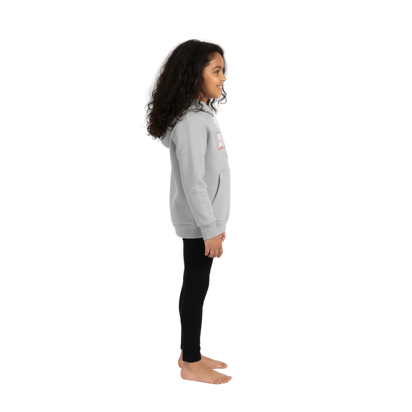 Child wearing a gray hoodie and black leggings on a white background