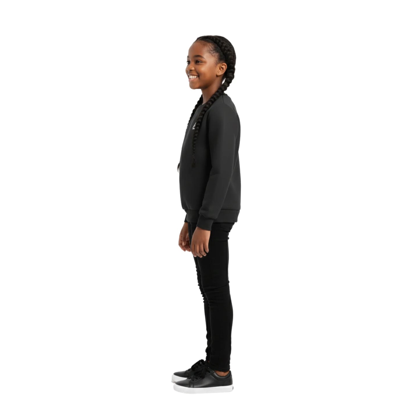 Person wearing a black jacket and pants on a white background