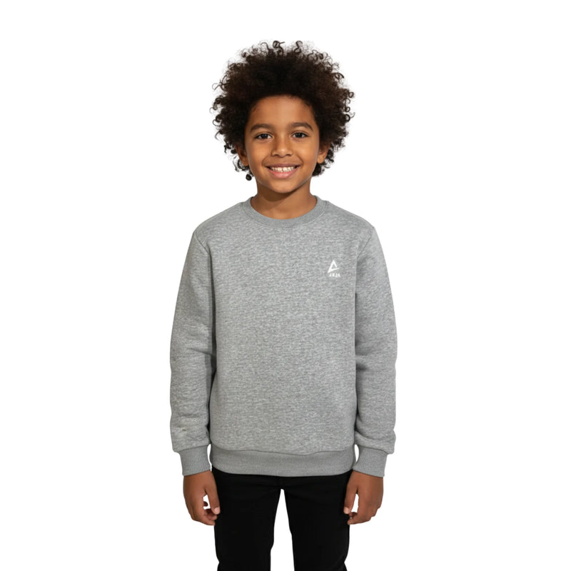 Child wearing a gray sweatshirt with a small logo on a white background