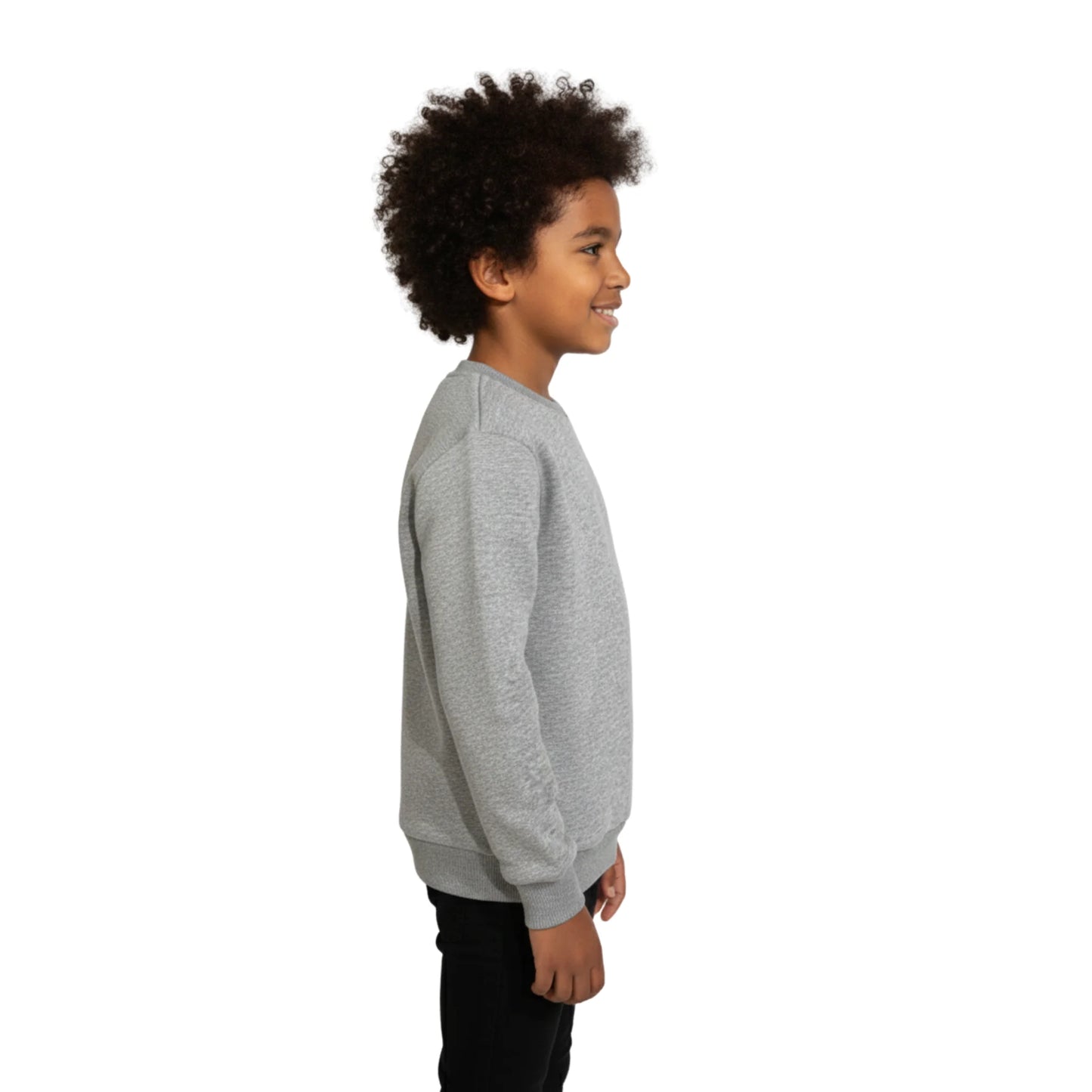 Child wearing a gray sweatshirt on a white background