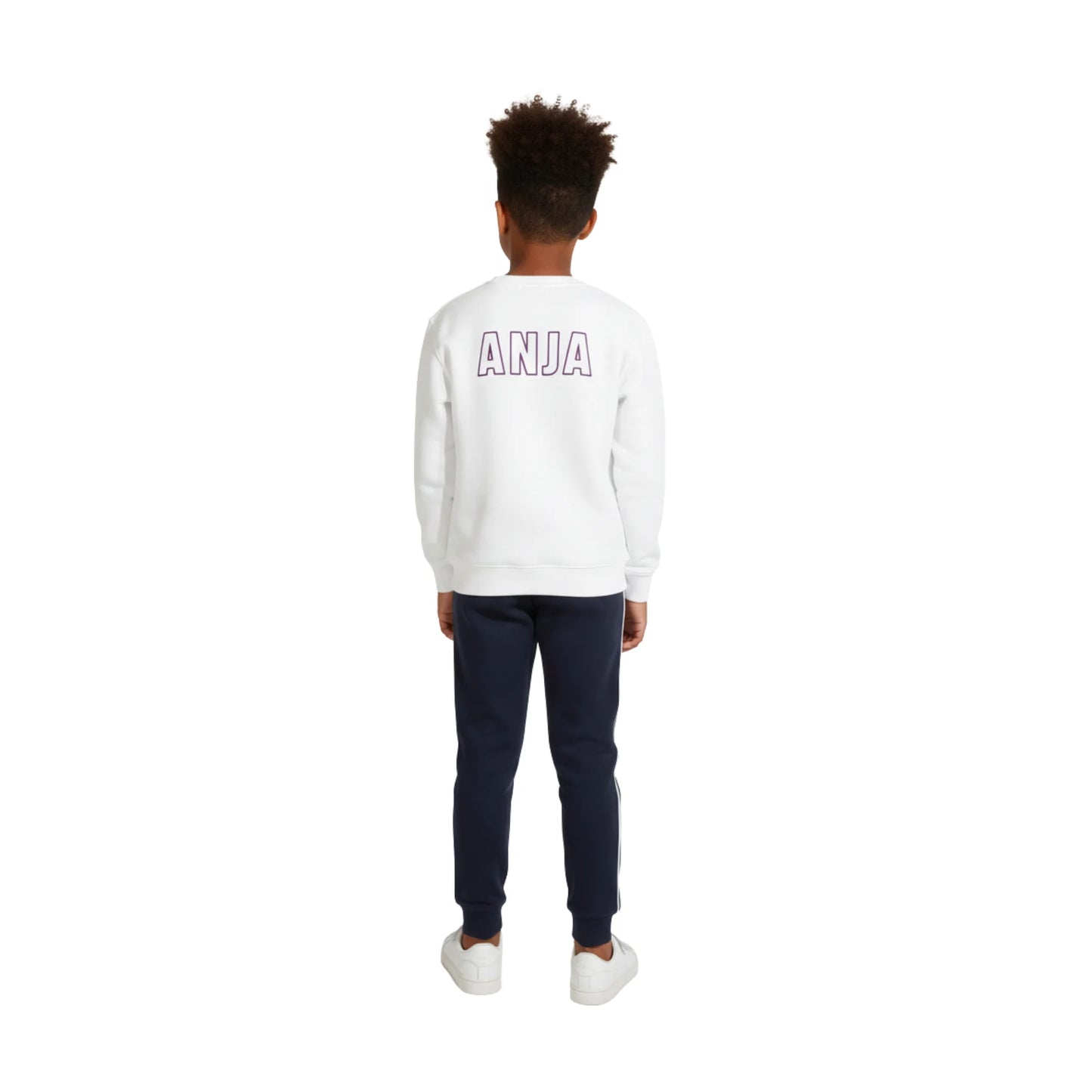 Person wearing a white sweatshirt with 'ANJA' printed on the back, standing against a white background.